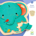 Djeco Puzzle de Madeira Elefante 14 peças. Puzzle infantil com design de elefante azul e pássaros coloridos, uma peça solta.