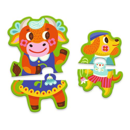 Detalhe de duas peças de puzzle duo encaixadas: a vaca grande e o cão, mostrando o encaixe e as ilustrações coloridas.