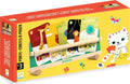 Caixa do produto Djeco "Porte-Cartes à Poser", mostrando o suporte de madeira com cartas e o painel traseiro decorativo com um gato.