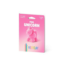 Embalagem individual de argila Hey Clay na cor rosa, com a figura de um unicórnio ("Pink Unicorn") e indicação de 1 lata e idades 3-99 anos.
