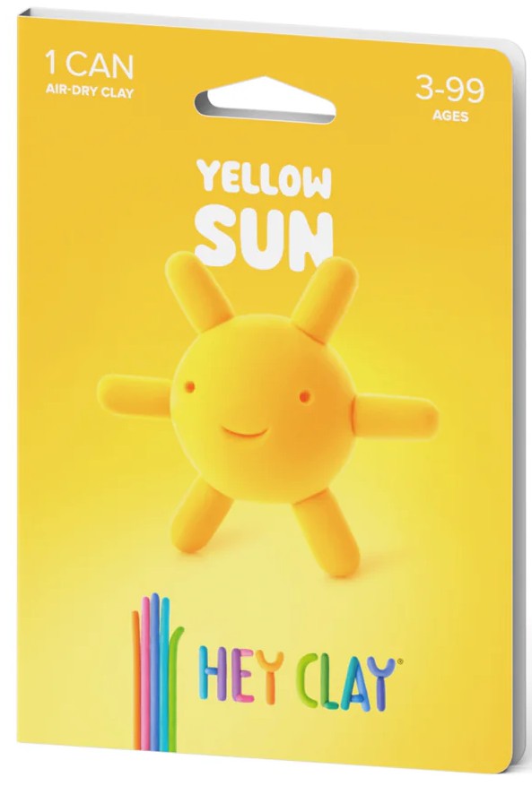 Embalagem individual de argila Hey Clay na cor amarela, com a figura de um sol ("Yellow Sun") e indicação de 1 lata e idades 3-99 anos.