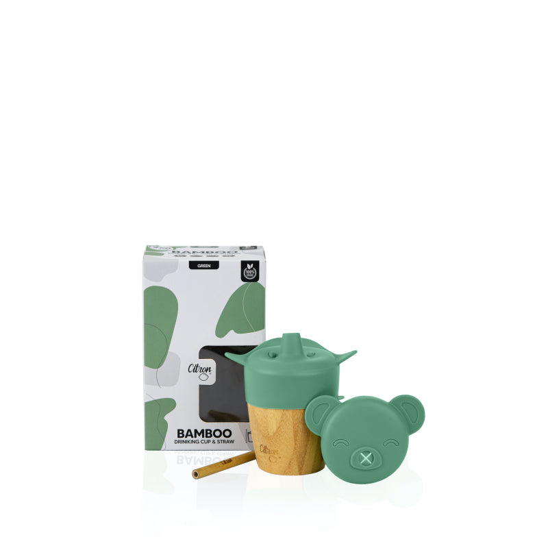 Embalagem do copo de bambu Citron "Bamboo Drinking Cup & Straw" na cor verde, com o copo e a tampa extra visíveis.