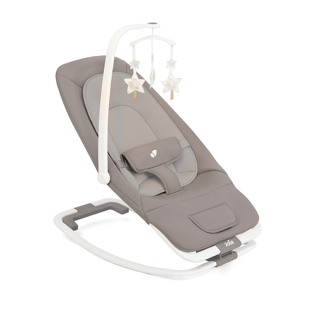 A espreguiçadeira Joie Dreamer vista de cima, mostrando o design de topo aberto para fácil acesso ao bebé.