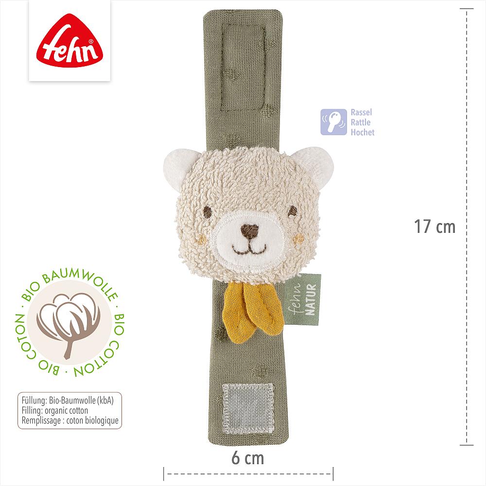 Dimensões da pulseira Fehn com guizo urso: 17 cm de altura e 6 cm de largura, com logótipo Fehn e selo de algodão orgânico.