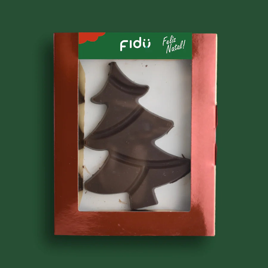 Tablete de chocolate Fidu em forma de árvore de Natal, embalada em caixa vermelha com etiqueta "Feliz Natal!". Chocolate de leite de coco 47% cacau BIO.