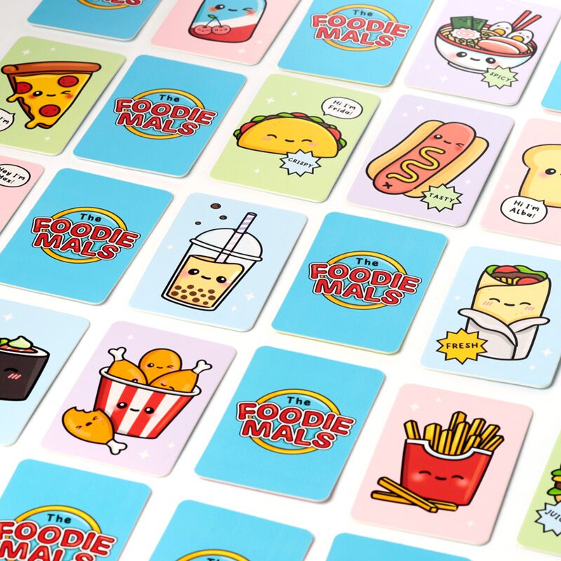 Detalhe das cartas do jogo Foodiemals Memory Cards, mostrando a variedade de alimentos e o design divertido.