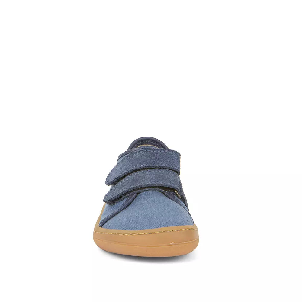 Froddo Barefoot sapatilha em lona azul com fecho em velcro e sola de borracha natural. Design minimalista e flexível, ideal para um movimento natural dos pés.