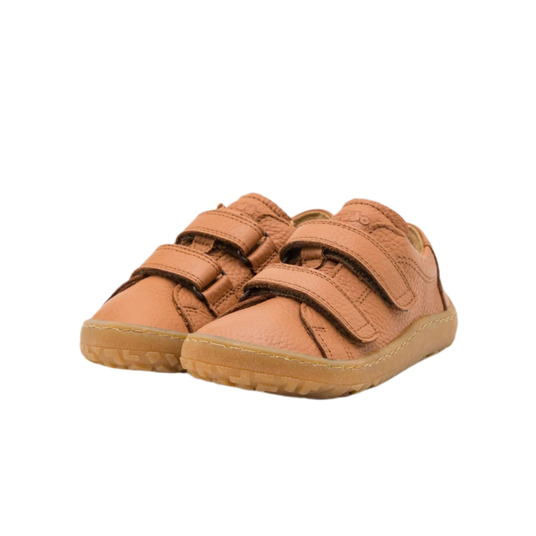 Froddo Barefoot sapatilha em couro castanho com fecho em velcro e sola flexível. Design minimalista para máximo conforto e liberdade dos pés.
