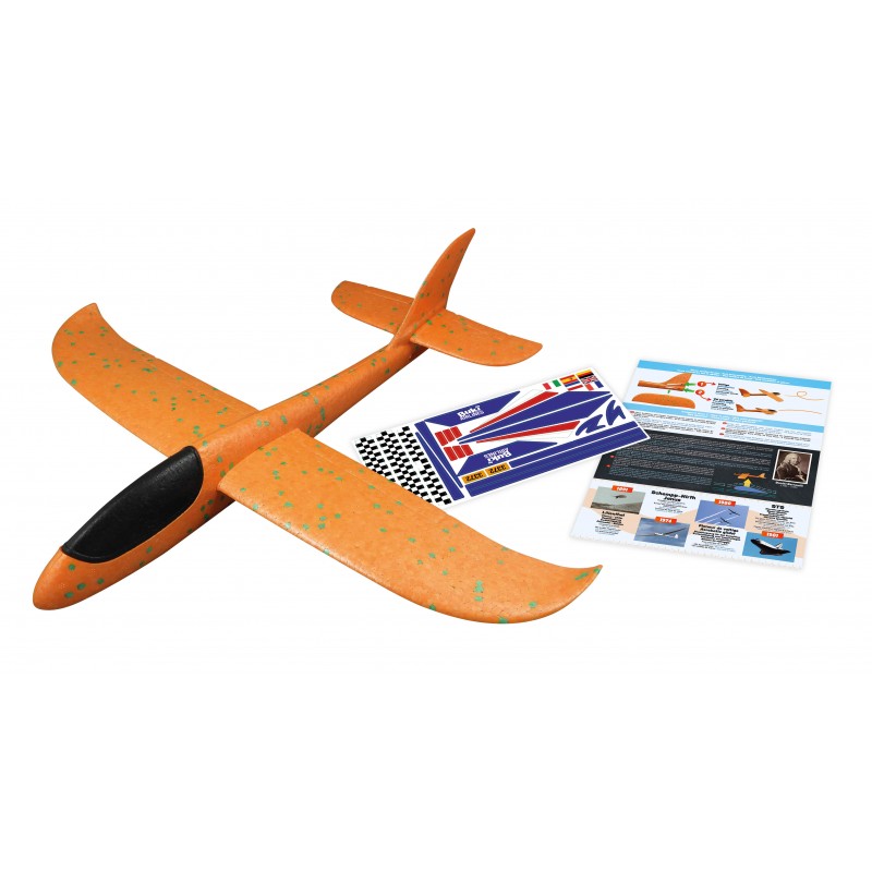Buki Avião Planador em espuma laranja desmontado, mostrando as asas, a fuselagem, a cauda, e o conjunto de autocolantes e o folheto educativo.