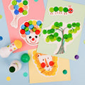 Haku Yoka 5 dot markers com exemplos de arte infantil colorida: palhaço, lagarta, árvore, leão.