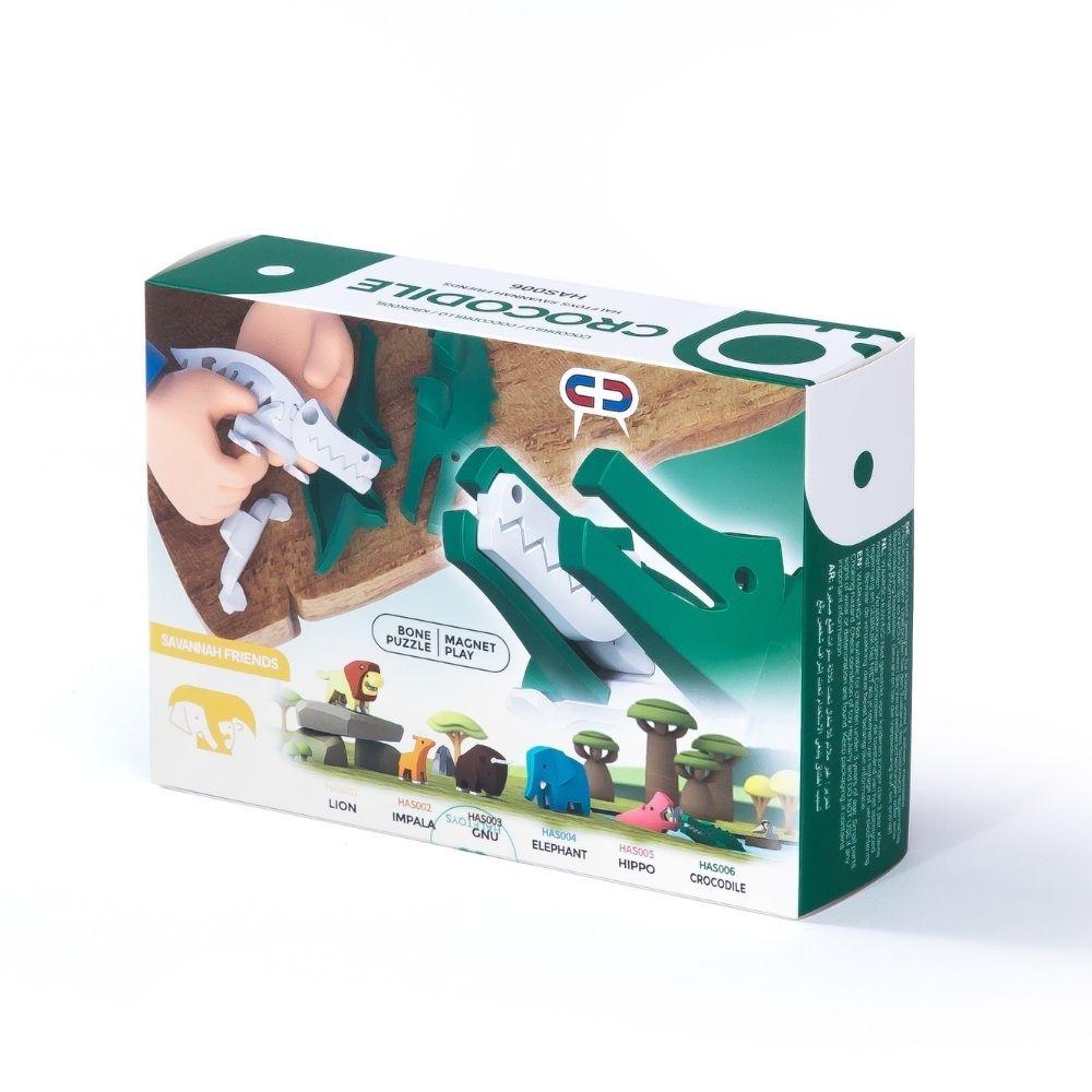 Detalhe da embalagem do puzzle Halftoys Crocodilo, mostrando os diferentes animais da coleção Savana Friends.