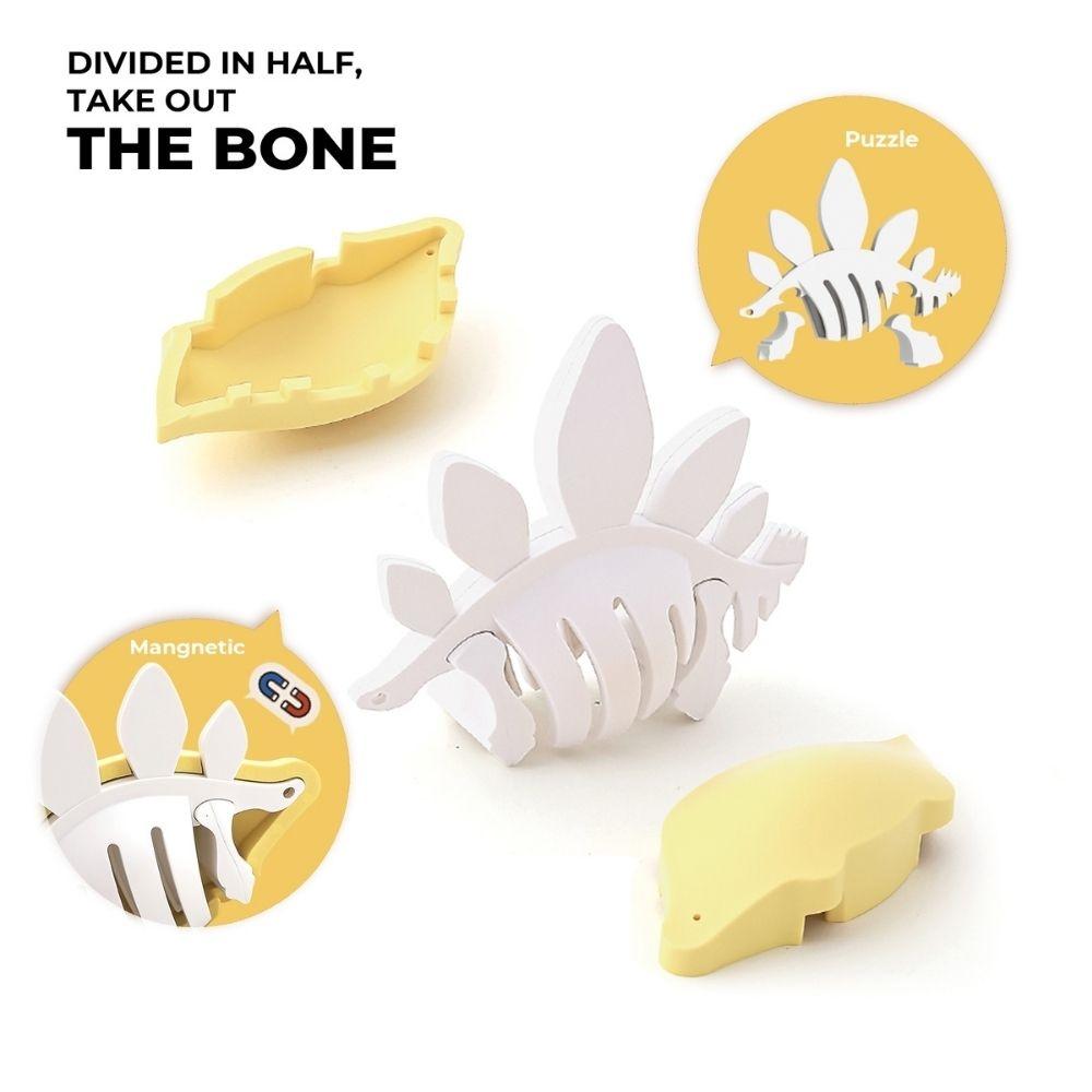 Como o Halftoys Stegosaurus se divide magneticamente para revelar o puzzle do esqueleto interno.