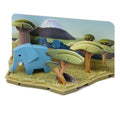 Diorama 3D Halftoys Elefante azul com cenário de savana e montanha.