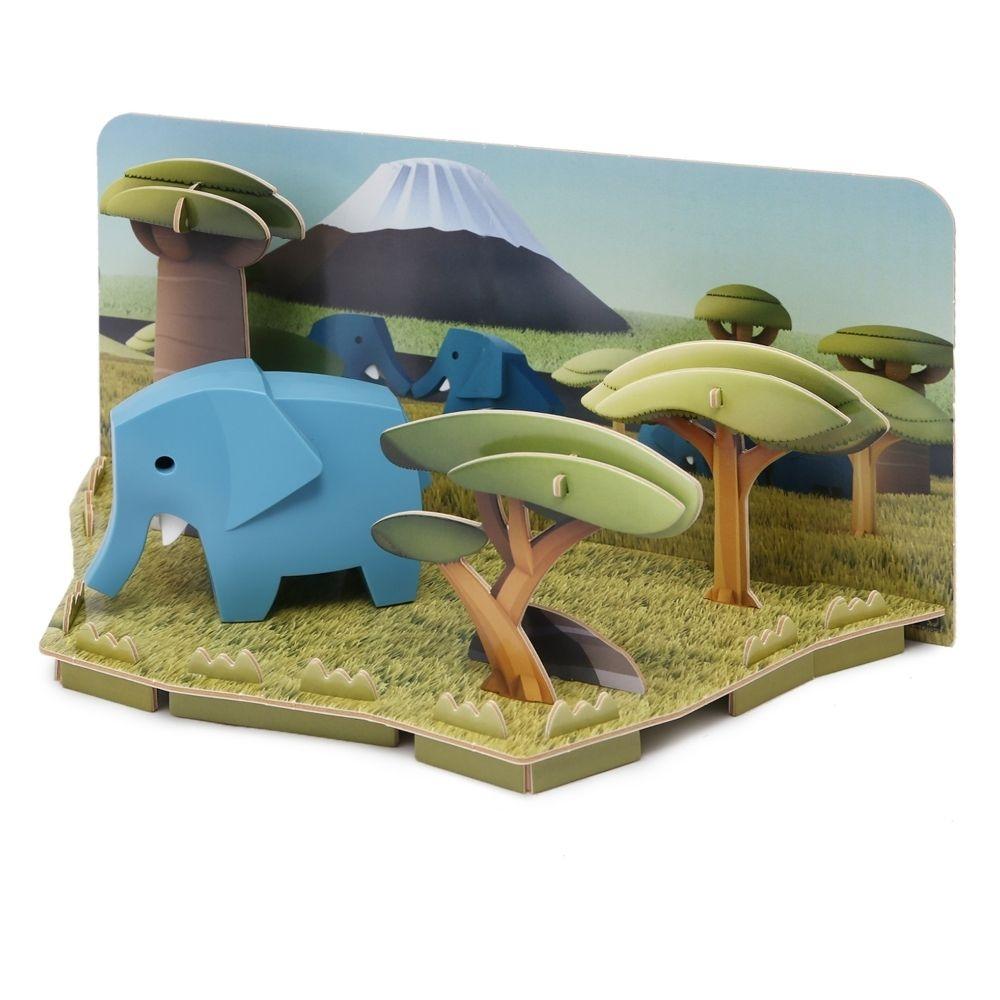 Diorama 3D Halftoys Elefante azul com cenário de savana e montanha.