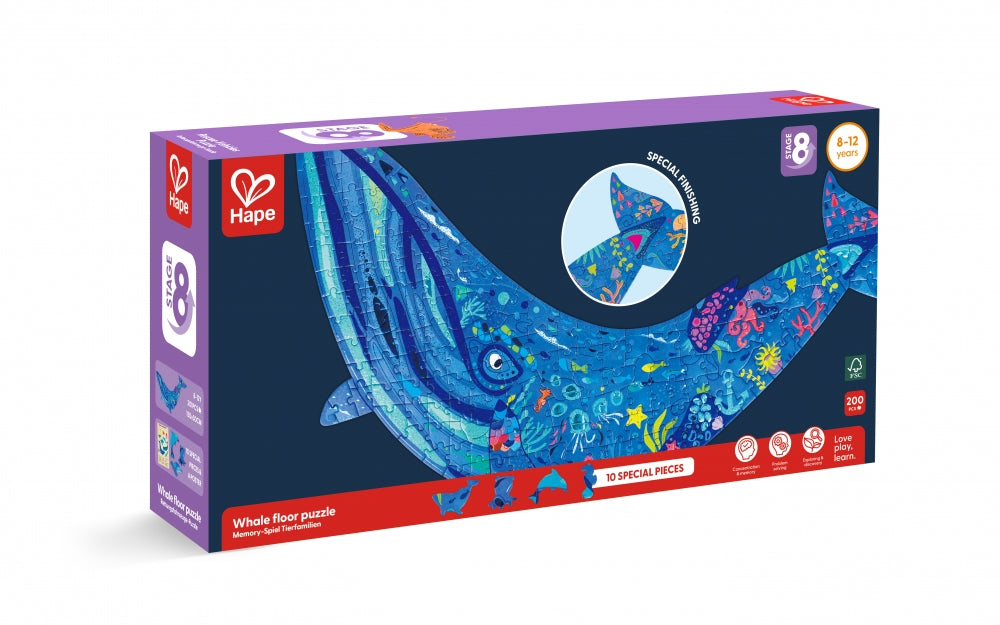 Caixa do Hape Puzzle Baleia Brilhante de 200 peças, com ilustração vibrante de baleia azul e detalhes marinhos.