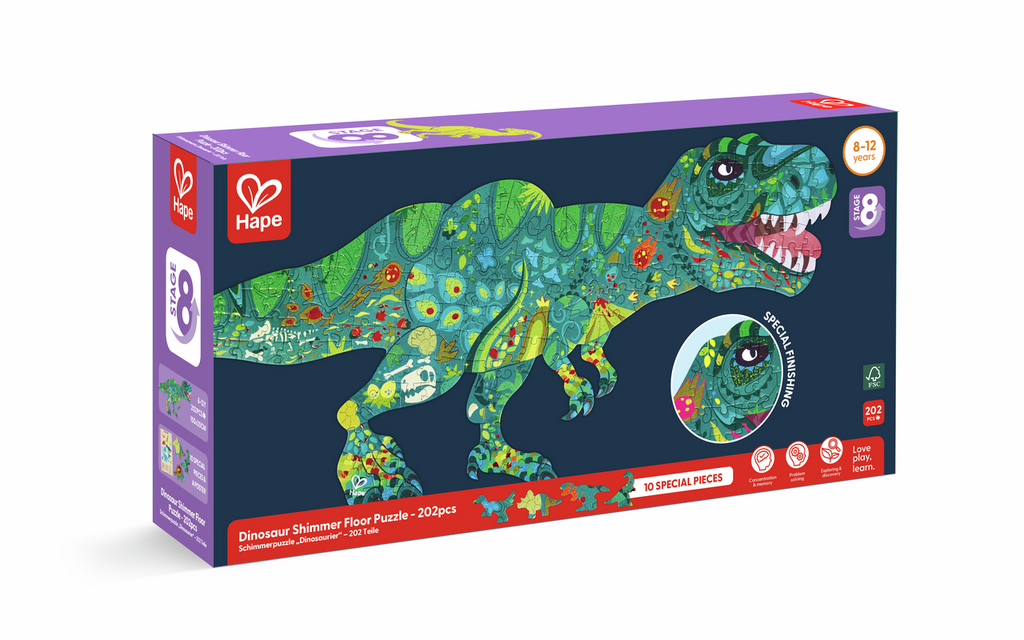 Puzzle Hape de dinossauro com 202 peças brilhantes sobre uma mesa