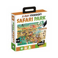 Crianca a montar o puzzle Headu Safari Park e a usar a lanterna UV para descobrir animais escondidos