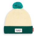 Gorro infantil Hello Hossy Hope de malha canelada bege e verde escuro, com pompom turquesa e etiqueta "COOL KIDS ONLY".