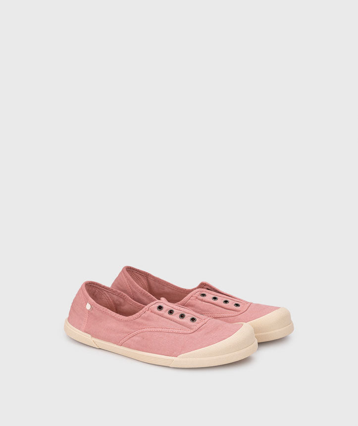 Par de sapatilhas Igor Barefoot em lona rosa velho, estilo slip-on, com sola bege, vistas de perfil num fundo neutro.