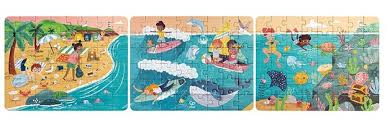Três puzzles completos do Hape 3 em 1 Oceano dispostos lado a lado, mostrando cenas de praia, mar com surfistas e vida subaquática.