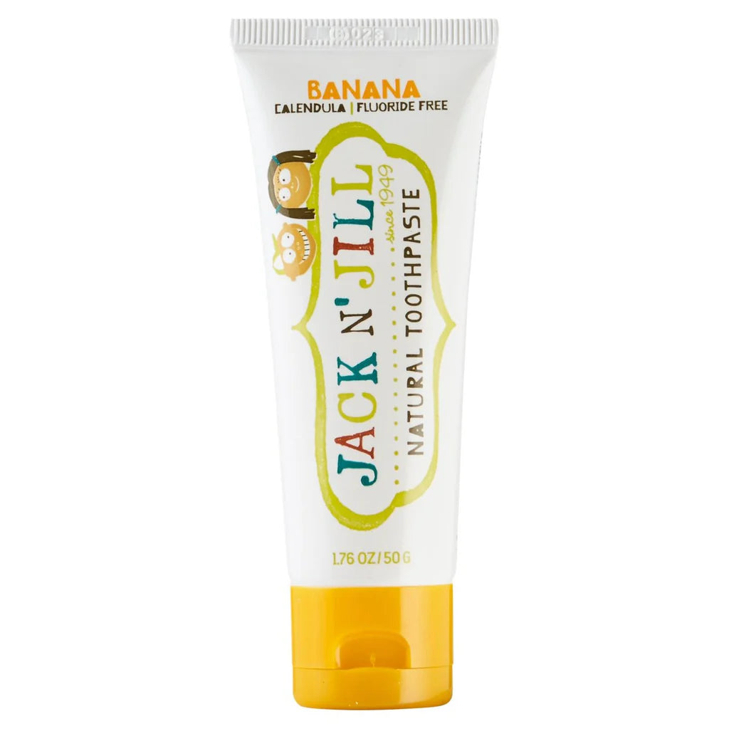 Pasta de dentes Jack n' Jill sabor a banana para bebés, com calêndula e sem flúor, numa embalagem branca e amarela.