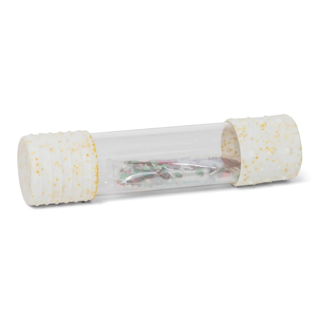 Garrafa sensorial Jellystone DIY com tampas de silicone brancas salpicadas, contendo elementos temáticos de dinossauro para criar a garrafa da calma.