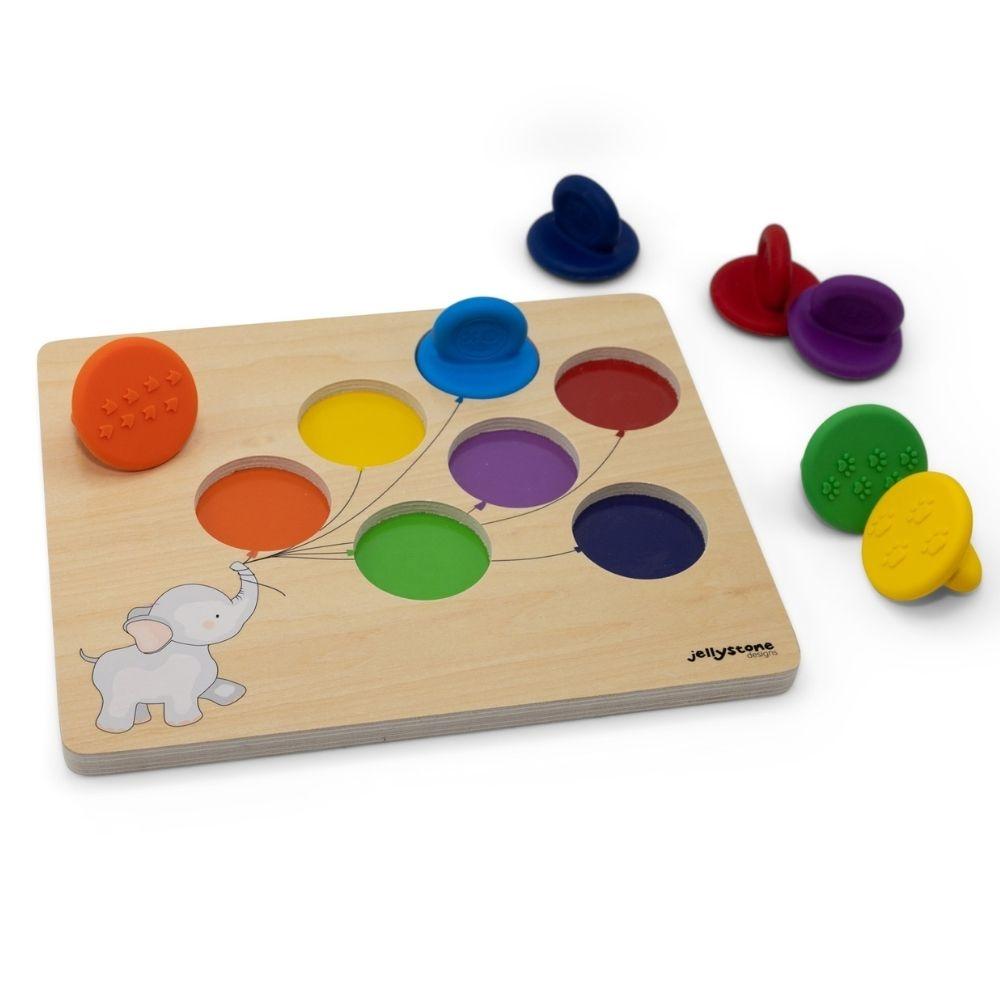 Conjunto de carimbos Jellystone: base de madeira com elefante e balões coloridos, com tampas de silicone coloridas para correspondência e uso como carimbo.