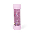 Garrafa da Calma Jellystone cor-de-rosa, cheia de purpurina e formas de estrelas, isolada sobre fundo branco.
