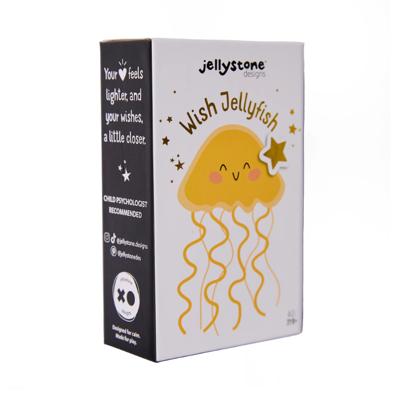 Caixa do produto Jellystone Wish Jellyfish com ilustração de alforreca amarela sorridente e estrelas, indicando ser recomendado por psicólogos infantis.
