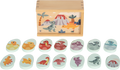 Todas as peças do jogo de memória Small Foot alinhadas, mostrando os diferentes tipos de dinossauros.
