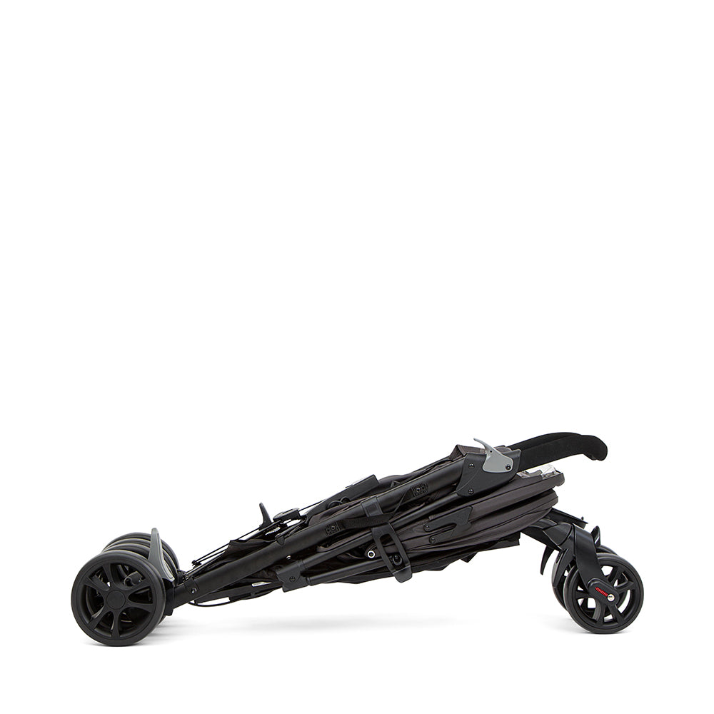 Detalhe do fecho rápido e compacto do carrinho Joie Brisk LX tipo guarda-chuva, demonstrando a facilidade de arrumação.