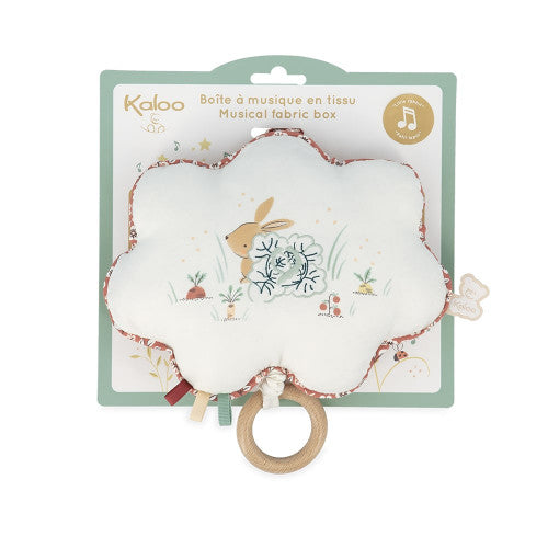 Embalagem do produto Kaloo Nuvem Musical, mostrando a almofada de coelho com anel de madeira e detalhes de tecido floral.