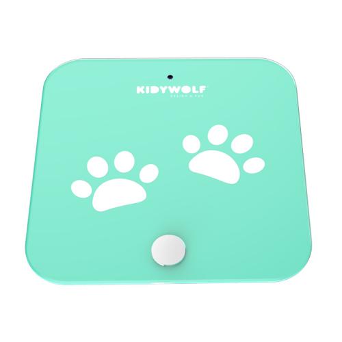 Balança KidyWolf verde-água com pegadas brancas, vista superior, sem o recetor de altura.