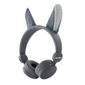 Auscultadores KidyWolf KIDYEARS Lobo cinzentos com orelhas magnéticas de lobo, vista frontal.