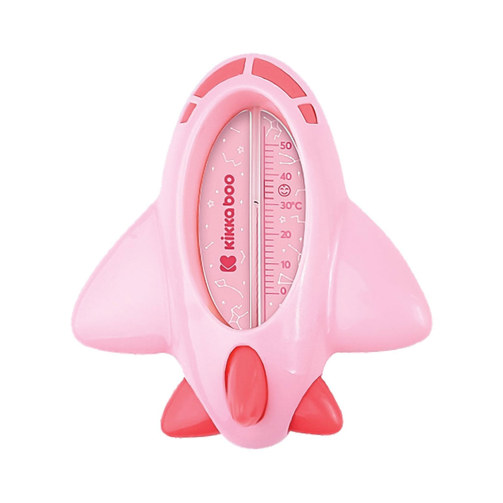 Termómetro Kikkaboo para água em forma de foguetão rosa, com escala de temperatura e detalhes de estrelas.