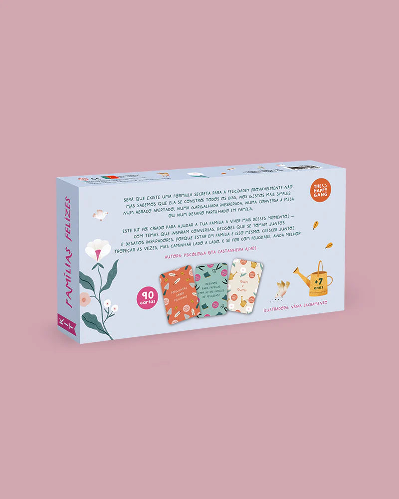 Verso da caixa do kit "Famílias Felizes" com texto descritivo, indicação de 90 cartas e idade +7 anos, e nomes dos autores.