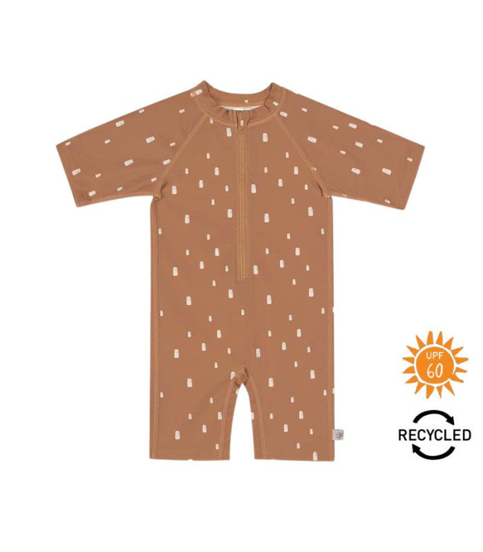 Fato de banho infantil Lassig castanho com padrão de pintas brancas, fecho frontal e proteção UV 60.