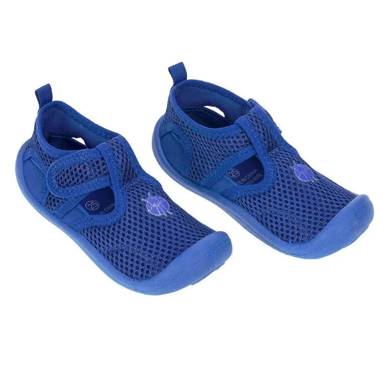 Sandálias barefoot Lässig em azul índigo, com material respirável e fecho em Velcro para ajuste seguro e confortável.