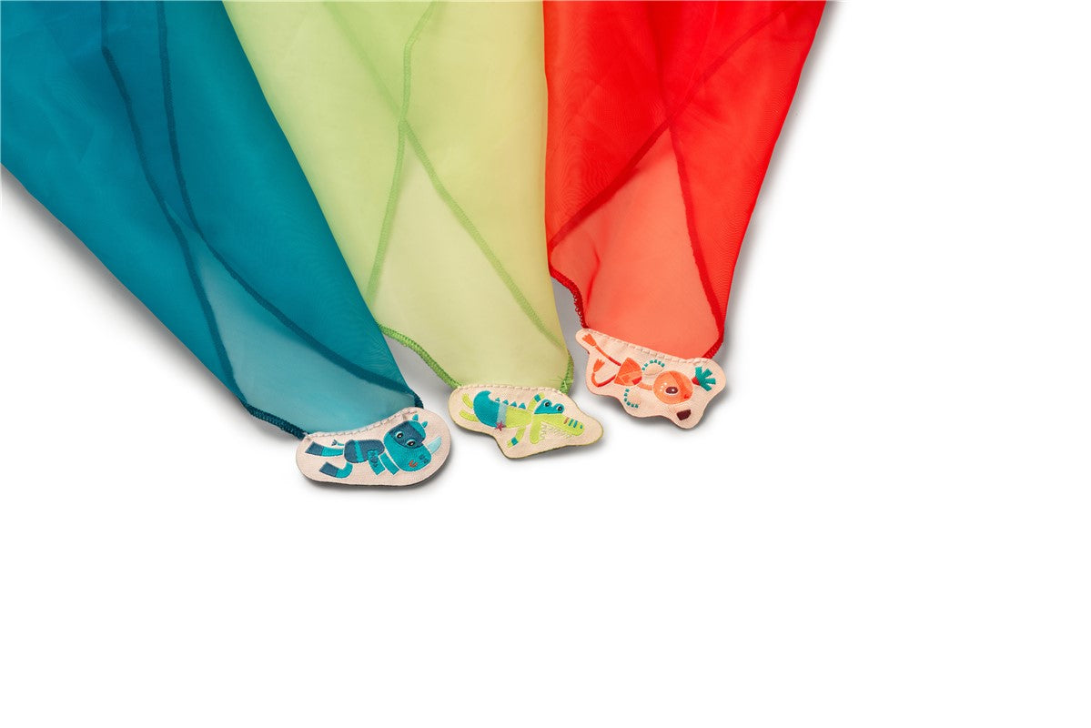 Detalhe de um lenço de malabarismo Lilliputiens, leve e colorido, com ilustração do personagem Anatole.