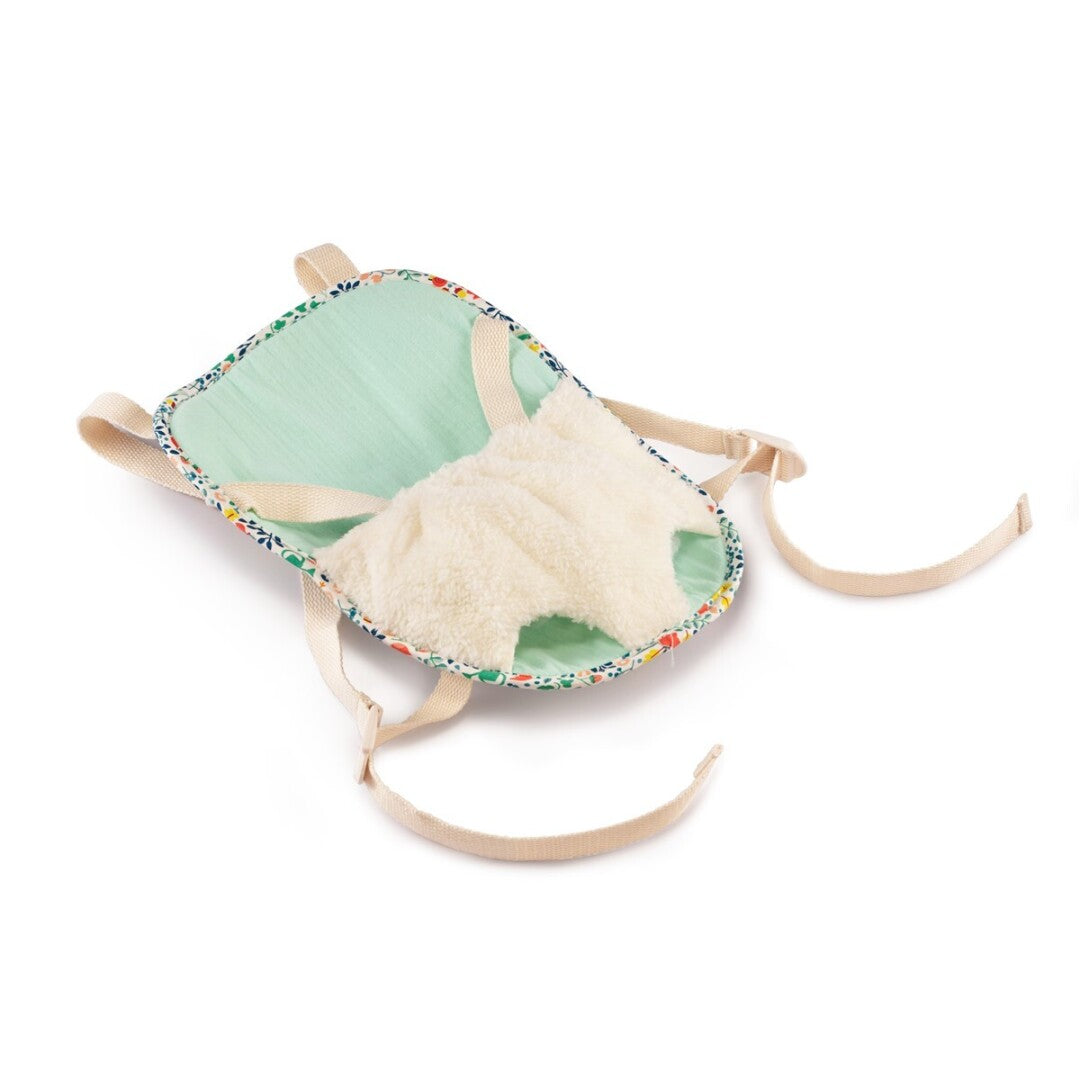 Porta-bebés Lilliputiens para bonecas, ilustrado com padrões primaveris coloridos, visto de frente.