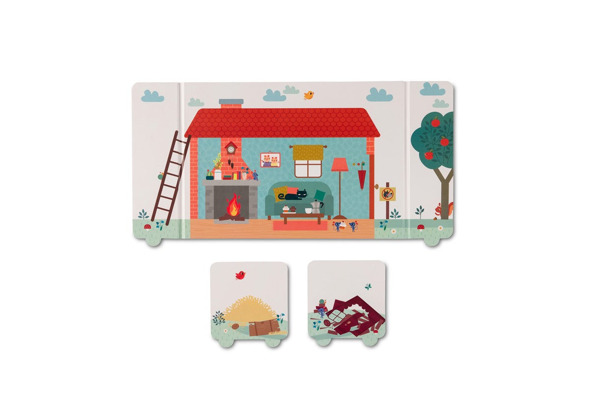 Detalhe dos cenários ilustrados e casas do teatro Os 3 porquinhos da Lilliputiens.