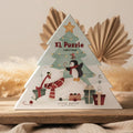 Puzzle XL de Natal Little Dutch montado no chão com formato de árvore de Natal e detalhes festivos