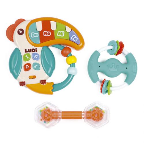 Conjunto de brinquedos musicais Ludi: caixa de música em forma de tucano com teclado e chocalho em forma de anel e maraca.