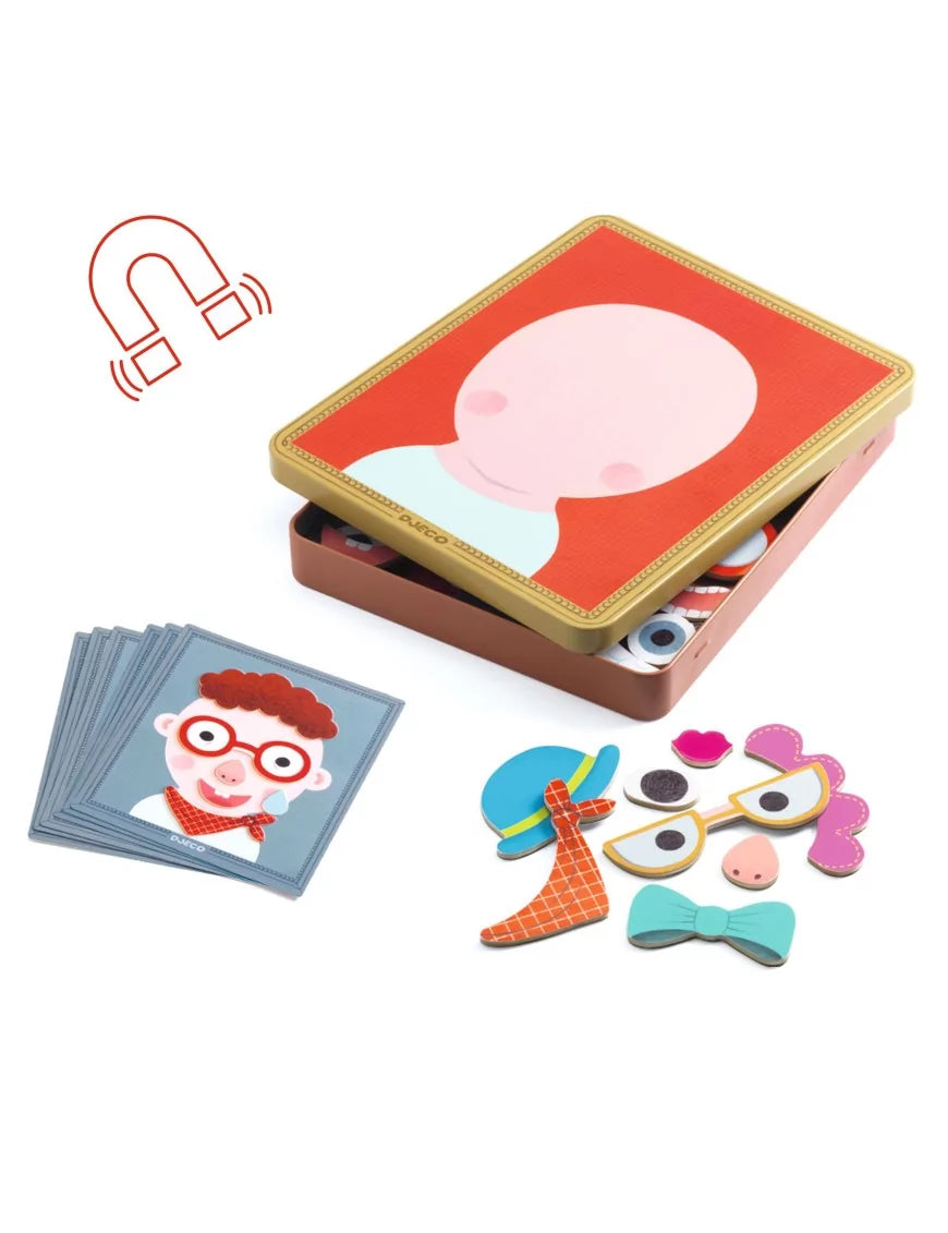 Jogo Djeco Inzebox Portraits em utilização, exibindo a caixa metálica, peças magnéticas espalhadas e cartões de exemplo.