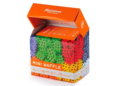 Caixa de embalagem dos blocos Mini Waffle Marioinex aberta, mostrando os blocos coloridos no seu interior.