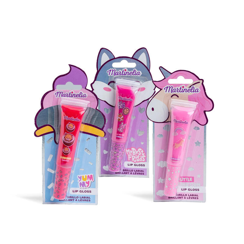 Três embalagens de gloss labial infantil Martinelia: Yummy (em formato de gelado), My Best Friend's (raposa) e Little Unicorn (unicórnio), mostrando as diferentes cores e designs.
