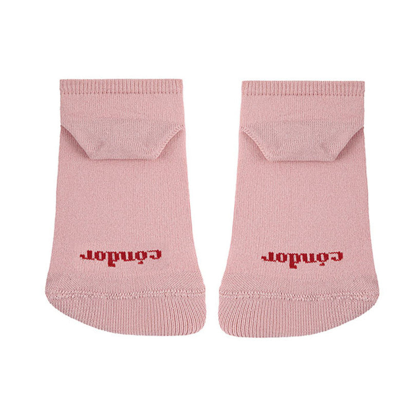 Par de meias cor de rosa com o logótipo "Condor" em vermelho na parte de trás do tornozelo, com um pequeno bolso dobrado.