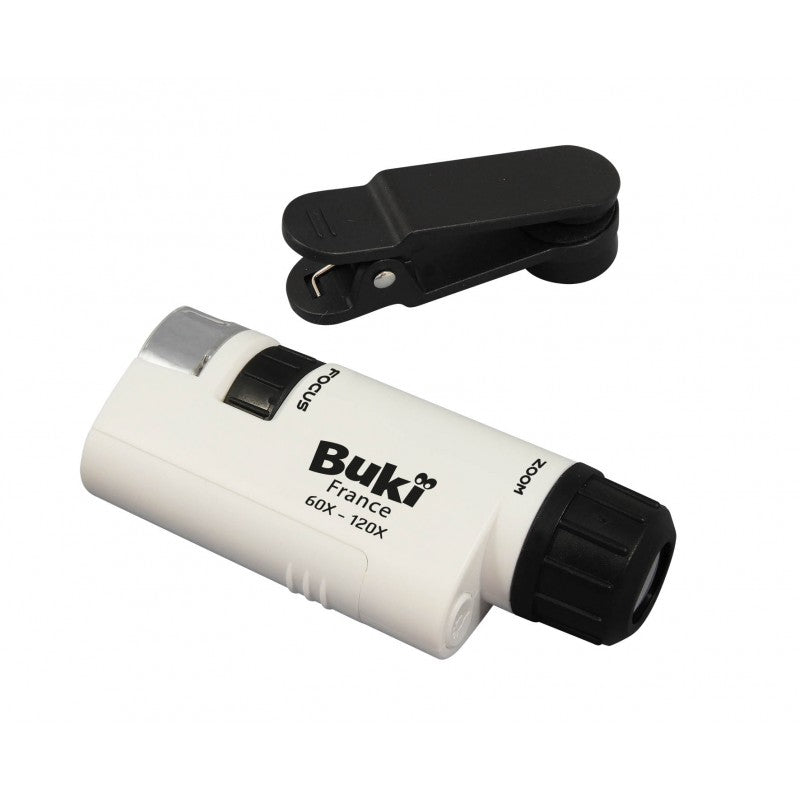 Microscópio de bolso Buki branco e preto, com ampliação 60x-120x, e adaptador de smartphone preto, isolados em fundo branco.