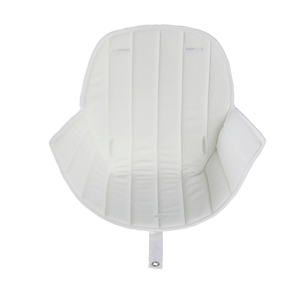 Almofada de assento acolchoada para cadeira de refeição Micuna OVO em branco, com aberturas para arneses.