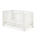 Berço Micuna Converbaby branco na configuração de berço 140x70 cm, com sommier ajustável, em fundo branco.
